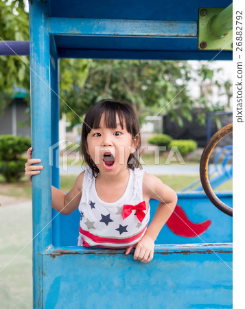 Happy asian baby child playing on playground Happy asian baby child playing on playground 26882792