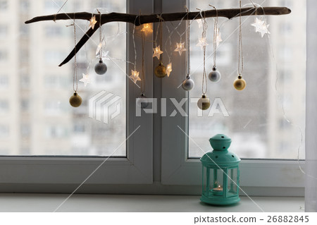 Christmas decorations on a window sill Christmas decorations on a window sill 26882845