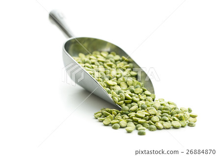 Green split peas in metal scoop. 26884870