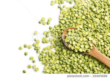 Green split peas in wooden spoon. 26884886