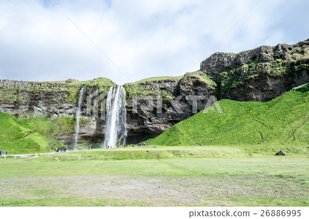 One of the hundreds of wter falls in Iceland 26886995