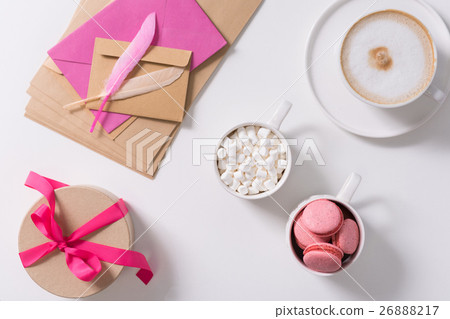 Gift box tied with pink ribbon standing on the 26888217