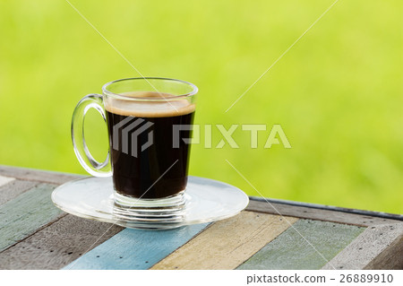 hot black coffee on wooden table hot black coffee on wooden table 26889910