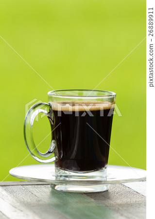 hot black coffee on wooden table hot black coffee on wooden table 26889911