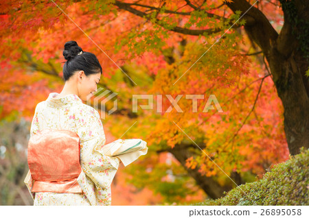 Autumnal leaves and kimono women 26895058
