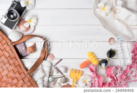 prepare accessories and travel items on white wooden background prepare accessories and travel items on white wooden background 26898408