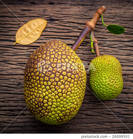 Sweet Jack fruit on shabby wooden background. Sweet Jack fruit on shabby wooden background. 26899501