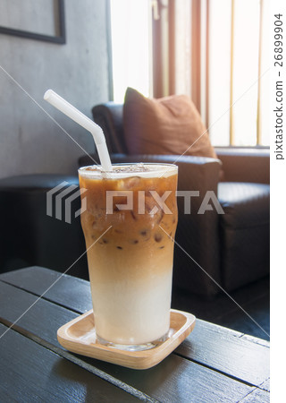 ice latte macchiato coffee in glass 26899904