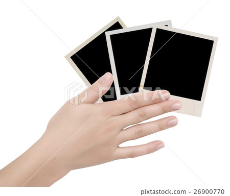 three photo frames in a hand 26900770