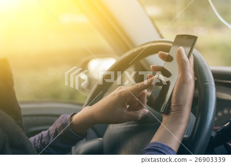driver with a cell phone 26903339