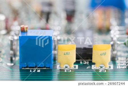 Closeup electronic hardware on the circuit board Closeup electronic hardware on the circuit board 26907244