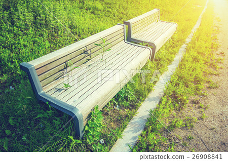 Wooden bench in park with vintage color. Wooden bench in park with vintage color. 26908841