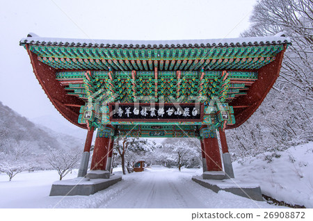 Gate of Baekyangsa Temple and falling snow. Gate of Baekyangsa Temple and falling snow. 26908872