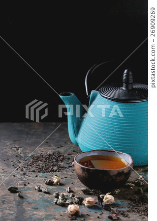 Variety of dry tea with teapot Variety of dry tea with teapot 26909269