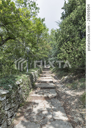 Stone road to Montale tower in San Marino. 26909804