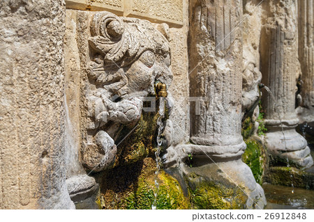 Stone lions head of the Rethymno Rimondi Fountain Stone lions head of the Rethymno Rimondi Fountain 26912848