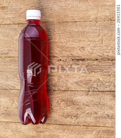 Soda bottle on the woode Soda bottle on the woode 26913301