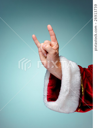 Photo of Santa Claus hand in rocker gesture Photo of Santa Claus hand in rocker gesture 26913739