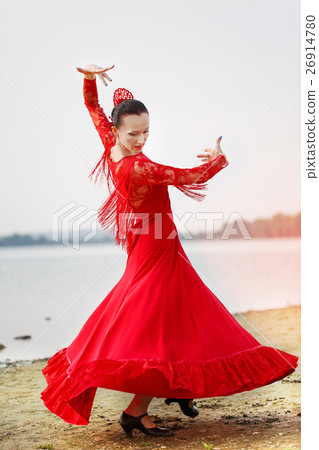 woman dancer wearing red dress woman dancer wearing red dress 26914780