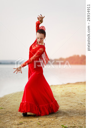 Flamenco dancer Spain woman in a long red dress Flamenco dancer Spain woman in a long red dress 26914911
