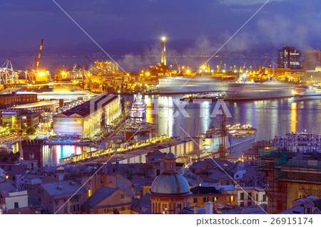 Old Lighthouse in port of Genoa at night, Italy. Old Lighthouse in port of Genoa at night, Italy. 26915174