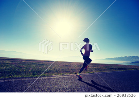 young fitness woman runner running on road 26938526