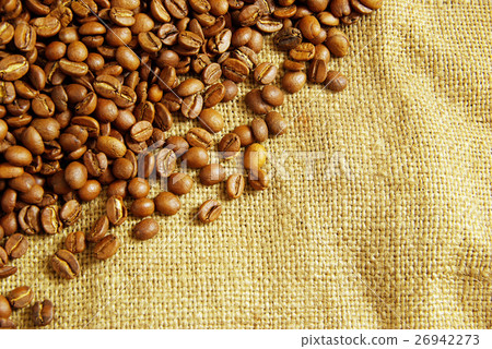 coffee beans on burlap background 26942273