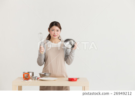 Women making white chocolate · white back Women making white chocolate · white back 26949212