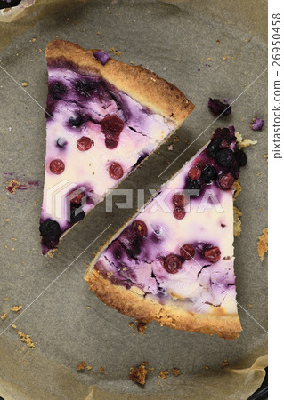 slices of cake with cream cheese with blueberries 26950458
