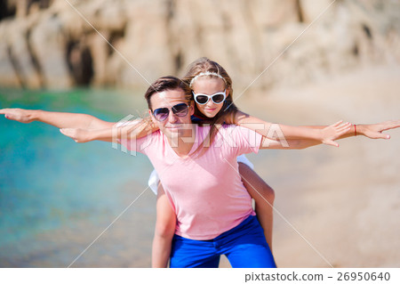 Father having fun with his adorable little girl on 26950640