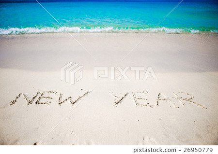 Happy New Year written in the white sand Happy New Year written in the white sand 26950779