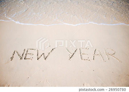 Happy New Year written in the white sand Happy New Year written in the white sand 26950780