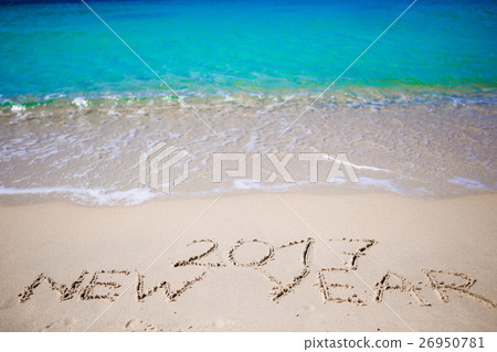 2017 New Year written in the white sand 26950781