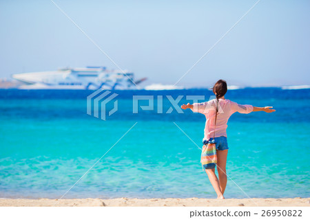 Young girl on the beach background big cruise 26950822