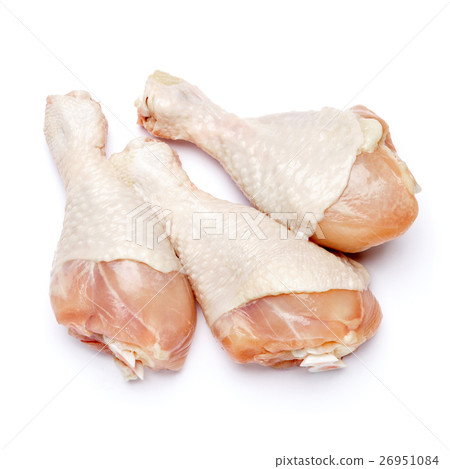 Raw chicken legs on a white background 26951084