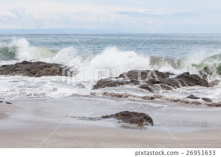 Waves crashing to rocks montezuma beach Waves crashing to rocks montezuma beach 26951633