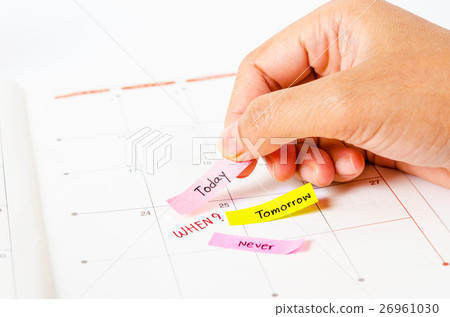 Hand Choosing the right date time management. 26961030