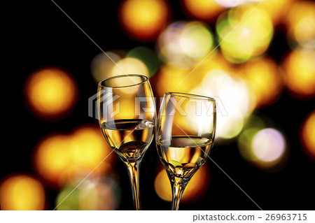 A toast with white wine 26963715