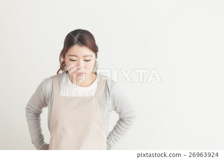 Woman in white apron · White back 26963924