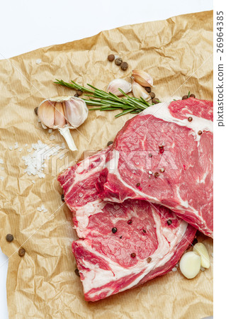 Uncooked organic shin of beef meat Uncooked organic shin of beef meat 26964385