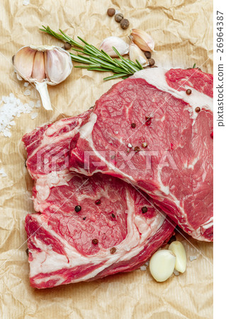 Uncooked organic shin of beef meat Uncooked organic shin of beef meat 26964387