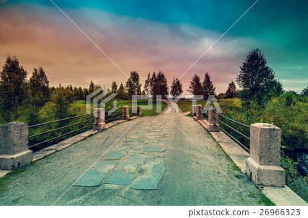 Bridge over river at sunset light 26966323
