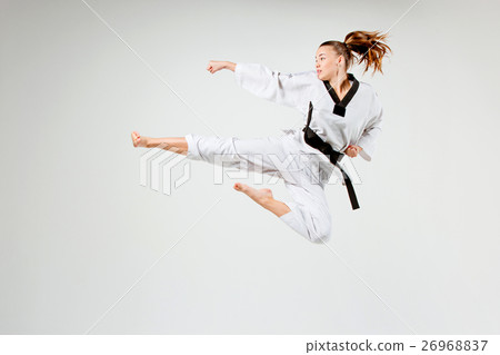 The karate girl with black belt 26968837