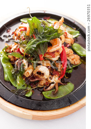 seafood stir fried with Thai herb. seafood stir fried with Thai herb. 26970351