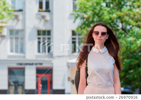 Portrait of girl looking at camera. Happy girl 26970916