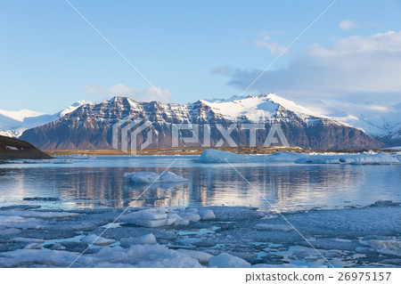 Winter mountain over winter lake 26975157