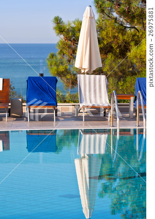 Swimming pool on a sunny day Swimming pool on a sunny day 26975881