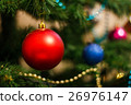 The red ball on the Christmas tree 26976147