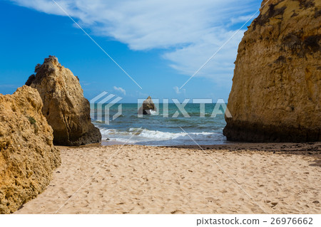 Rocky cliffs on the coast of the Atlantic ocean Rocky cliffs on the coast of the Atlantic ocean 26976662