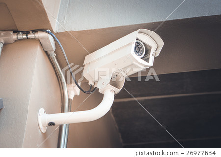 CCTV security cameras outside the white building CCTV security cameras outside the white building 26977634